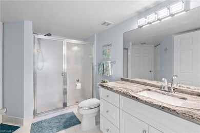 Bathroom featuring tile patterned flooring, walk i