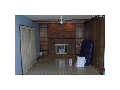 Family room with entry to sun room.  Home has been
