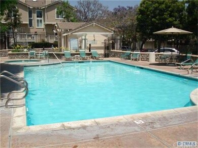 Property overlooks the pool area and spa