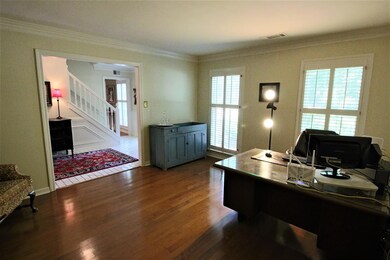 Gorgeous Hardwood Floors Make This Living Area Com