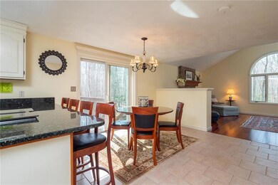 The eat-in kitchen with sliding...