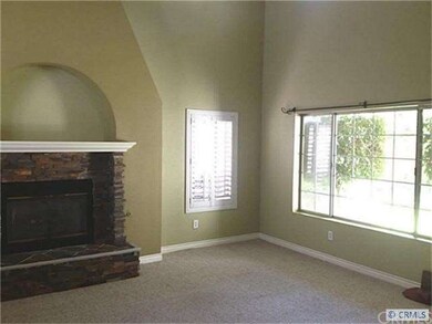 Dining room adjacent to living room overlooking ba