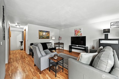 Small hallway leads you into main living space. Open and bright.