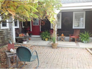 Exterior Front. courtyard with brick...
