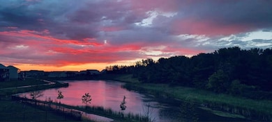 A seasonal picture with a beautiful colorful sunset view off the deck