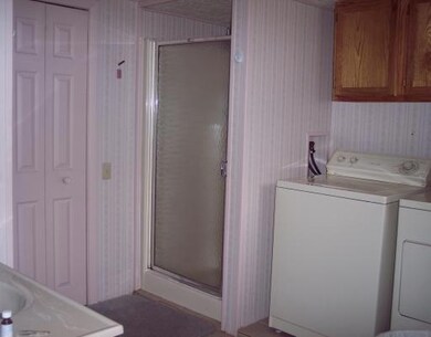 Bathroom. Downstairs bath nicely...