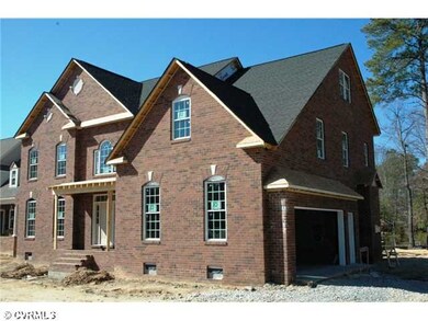 Exterior Front - Side view of home under construct
