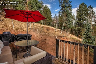 View of yard featuring a wooden deck