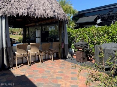 View of patio featuring area for grilling