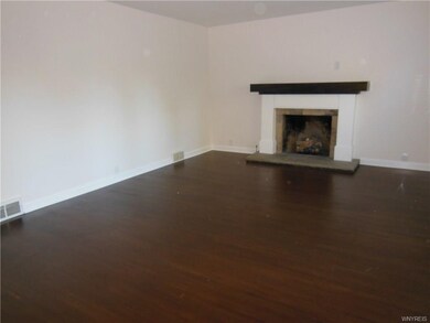 Living room, refinished hardwood floors.