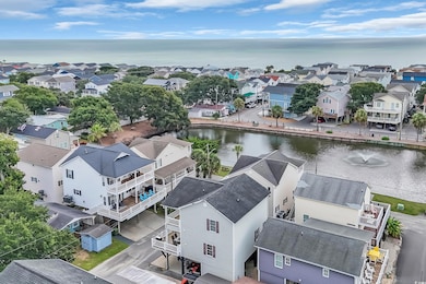 Aerial view of residential area with a large body of water