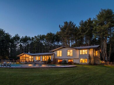 Exterior at dusk, waterfront side