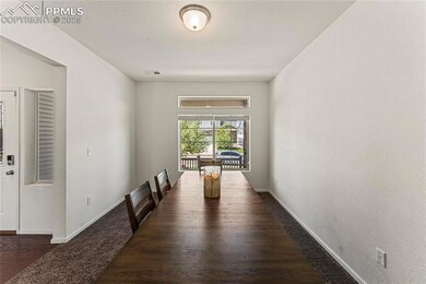Unfurnished dining area featuring baseboards, visi