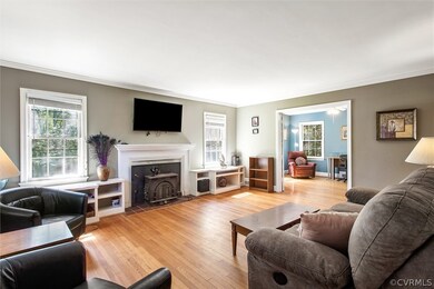 Family room with wood burning fireplace and wood s