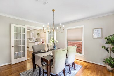 Double French door lead into the kitchen from the