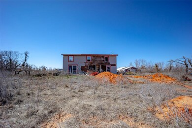 Back of property featuring a wooden deck