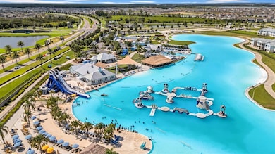 31440 Barrel Wave Way, Wesley Chapel, FL 33545 - photo 2