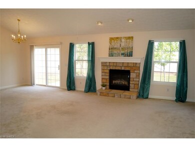 Gas fireplace, formal dining room. Slider leads to