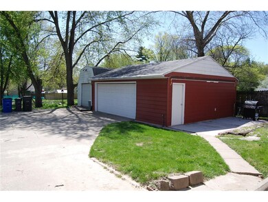 Oversized 2 car garage with furnace and shed to ho