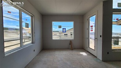 Dining nook with an abundance of natural light and walks out to deck! Please, excuse our dust as this home is currently under construction.