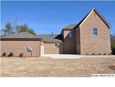 This home a 3 car garage with a motor court.