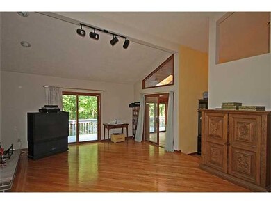 Family Room Large fireplaced family room opens to