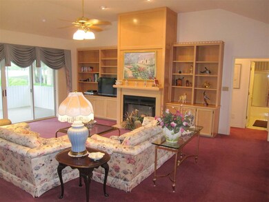 and laundry room thru hallway to right. Built ins.