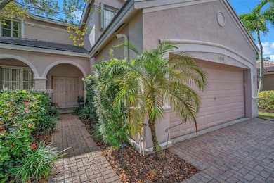 1058 Tupelo Way, Weston, FL 33327 - photo 2