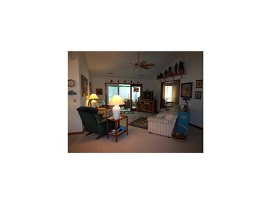 Living Room. Vaulted ceiling in living room gives 