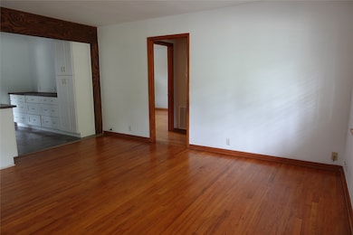 Original hardwood floors adds charm to this home.