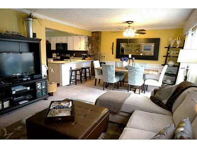 Interior Space/Layout. Living room opens to the di