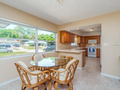 Dining space off the kitchen with a breakfast bar.