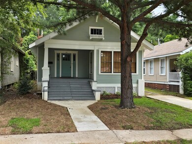 Bungalow featuring covered porch