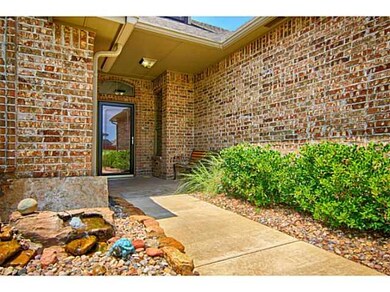 Exterior Front. Front Walkway w/ Water Fountain