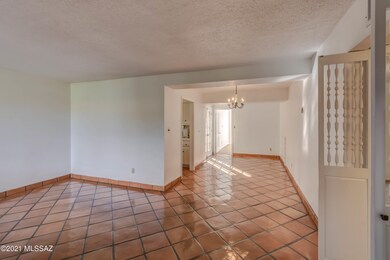Enter to living area with dining beyond