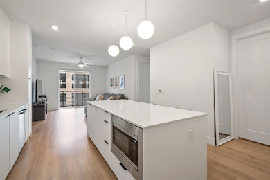 Kitchen featuring modern cabinets, stainless stee