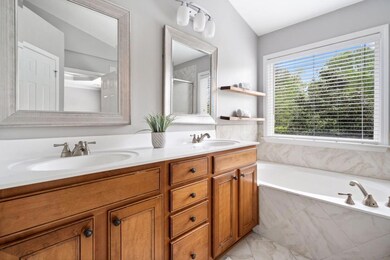 Primary Bathroom With Dual Vanities, Large Soaking