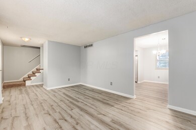 Living Rm to Front Entry & Din Rm