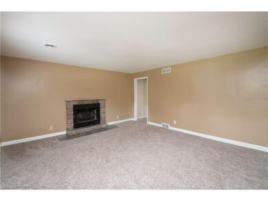 Living Room with Wood Burning Fireplace