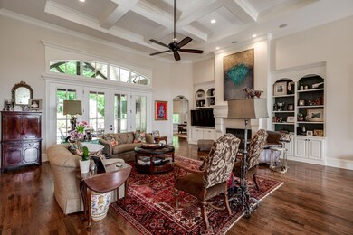 The fireplace is the focal point for this massive room.   Can't  you see your family spending cool winter nights here or heading out to the outdoor entertaining area for warm summer nights?