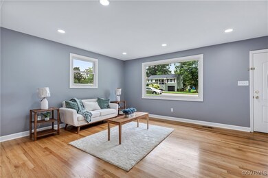 Living room featuring light hardwood / wood-style