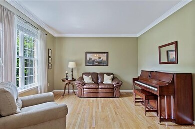 Living Room, crown moldings, large picture window 