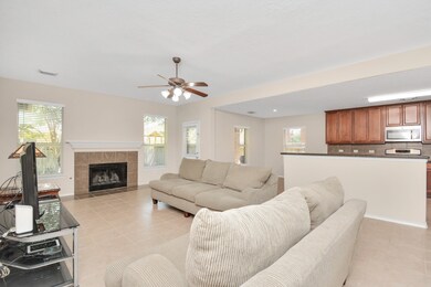 Cozy up to the traditional style fireplace.