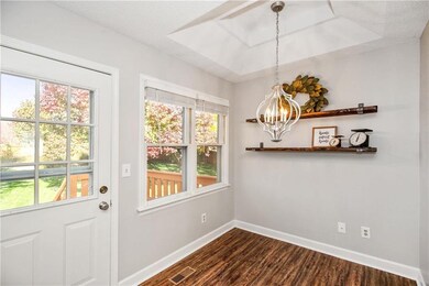 Charming breakfast nook with farmhouse shelving an