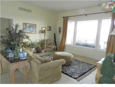 The Living Room Has Beautiful Tiled Flooring!
