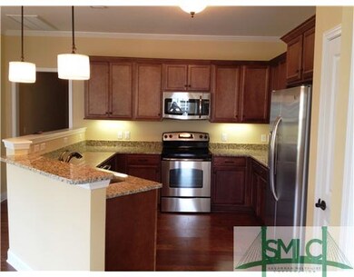 Kitchen. Maple cabinetry with stainless steel appl