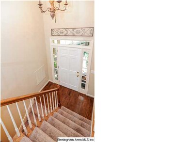 Two-story foyer with lots of natural light.