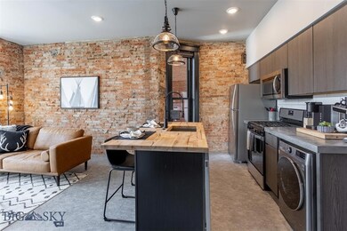 Kitchen featuring appliances with stainless steel