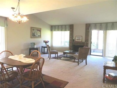 Large entertainment area with vaulted ceilings and