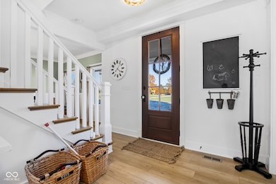Tray Ceiling in Entry accented w/ Crown Molding